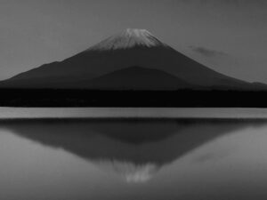 Classic view of Mt Fuji from Lake Shoji, one of Fuji's 5 lakes at twilight.