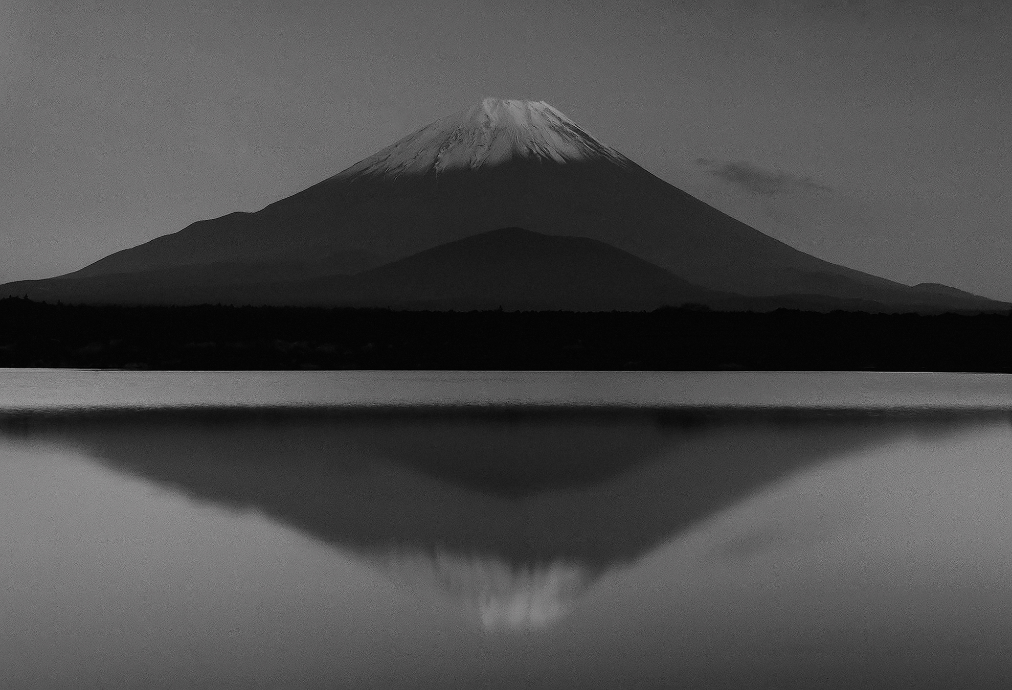 Classic view of Mt Fuji from Lake Shoji, one of Fuji's 5 lakes at twilight.