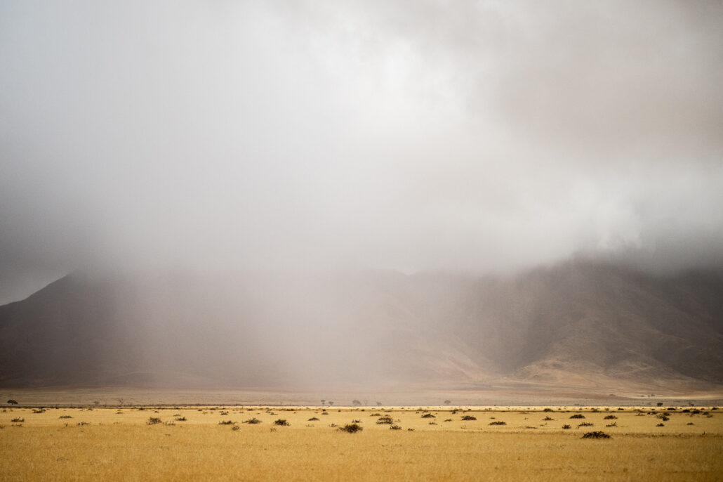 Clouds rolling over the Namibian landscape as a rainstorm approaches on the D707 scenic drive.