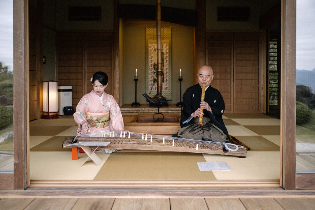 A koto player and Japanese flute playing at a destination wedding in Japan. In Nara, just outside of Kyoto.