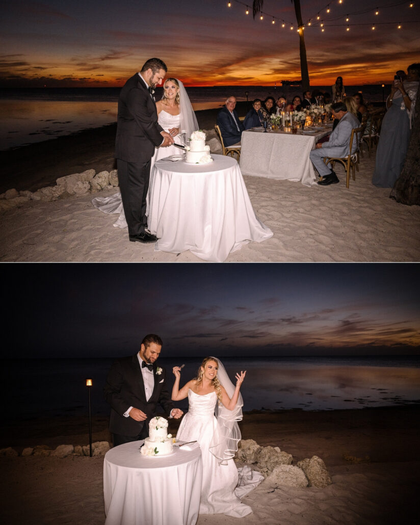 The bride and groom cut a white cake on the sand under an orange sky at their private island wedding reception, then she throws up her hands and laughs.