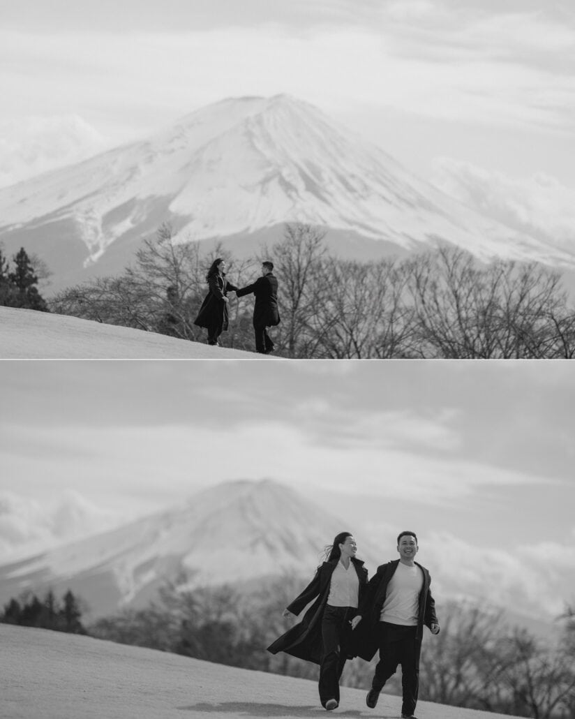 The couple hold hands at arm's length on the Kawaguchiko hilltop where the marriage proposal happened, then run across it laughing.