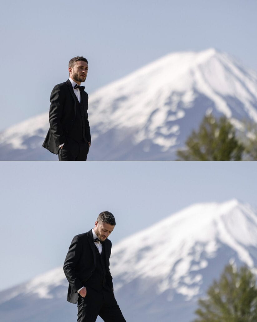 Two black tie groom portraits at Mt Fuji, hand in pocket, one looking out and one looking down, the snow-capped mountain soft behind him.