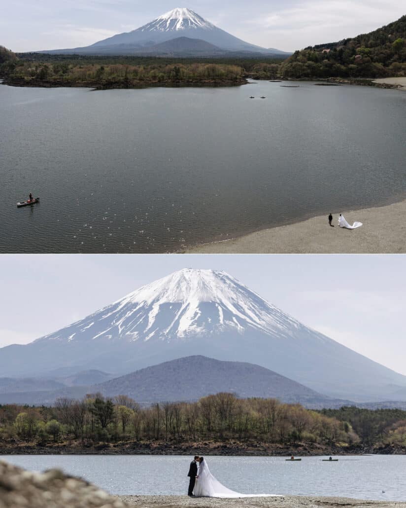 A drone looks across Lake Shoji to Mt Fuji with the couple small on the pale beach, and below they kiss on the shore beneath the mountain.