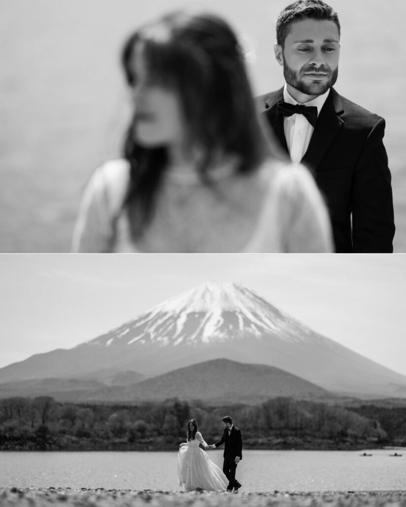 In black and white, the groom looks down toward the bride in soft focus, then the couple walk hand in hand on the Lake Shoji shore below Mt Fuji.