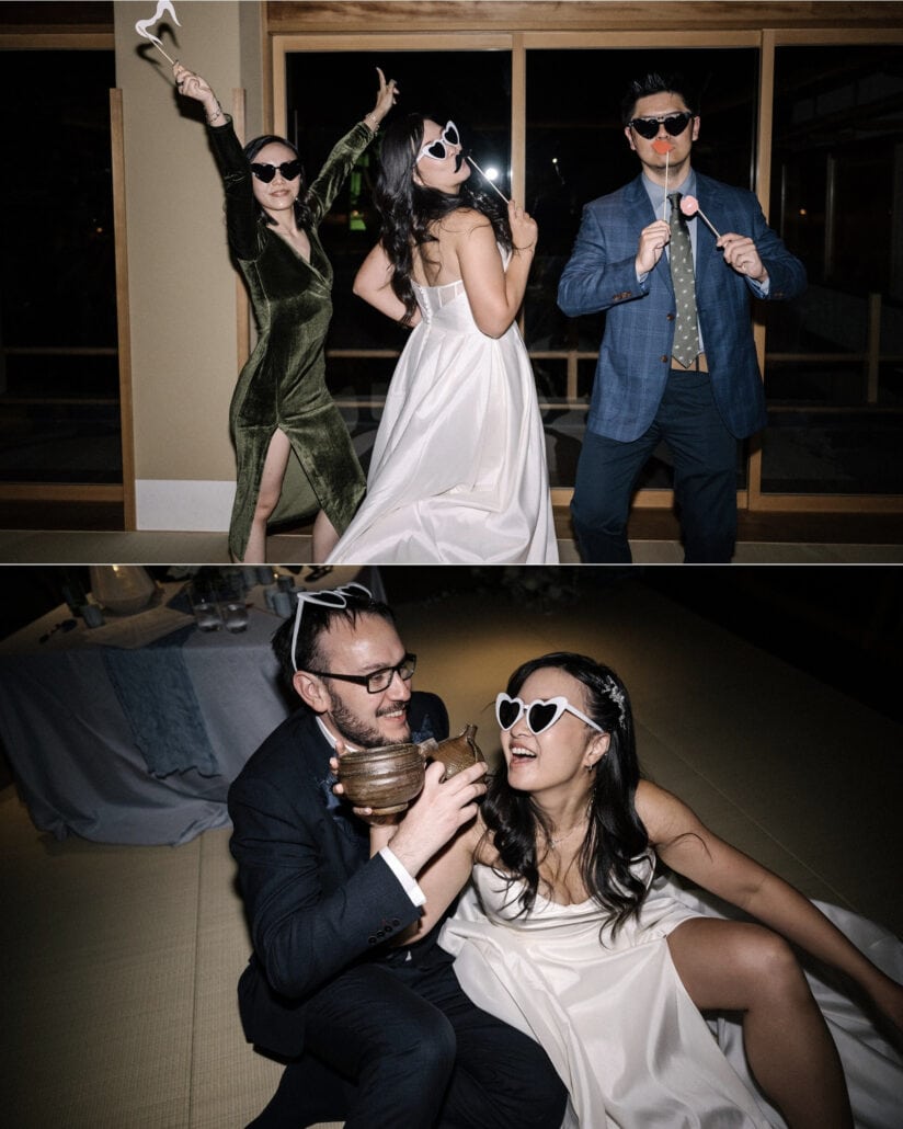 The bride and two friends pose in sunglasses with photo props at the after-party, and the groom raises a ceramic cup beside her on the tatami.