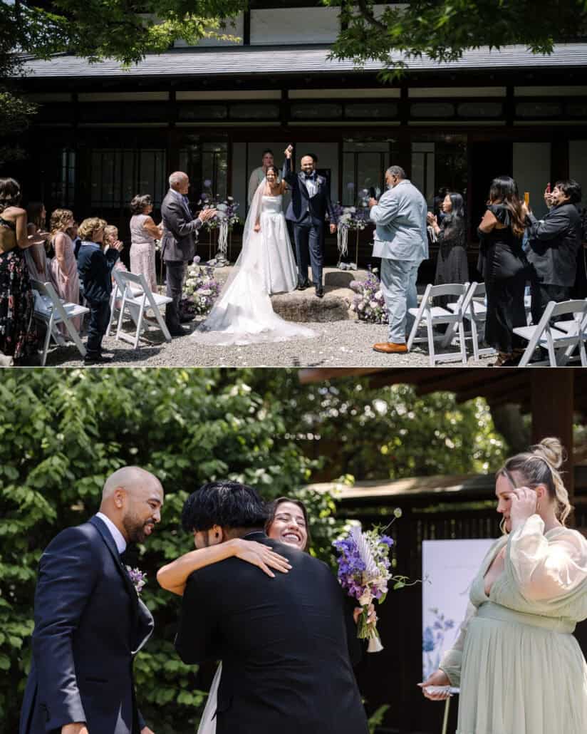 The groom raises a fist as guests stand and cheer the just married couple, then hugs with friends at the garden ceremony.