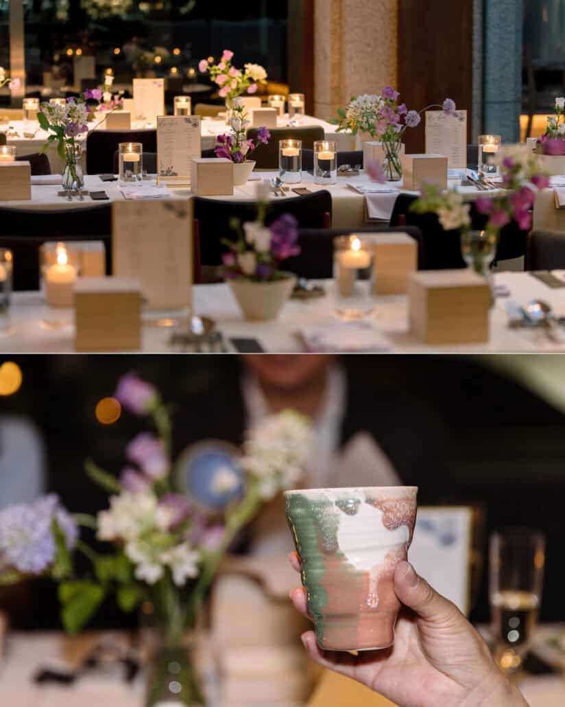 A guest raises a handmade ceramic cup over the candlelit tables at an intimate wedding reception in Tokyo.