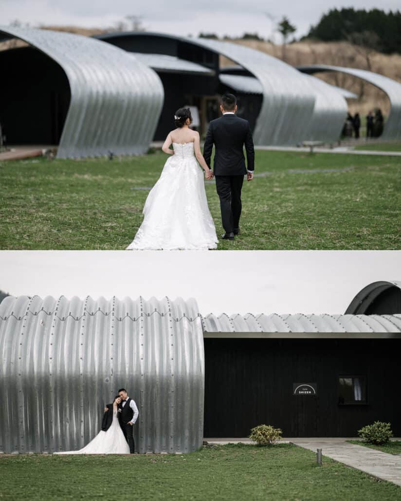 The couple walk hand in hand to the silver vaults of Fujisan Winery, then lean together by Cafe Shizen, a unique wedding venue in Japan.