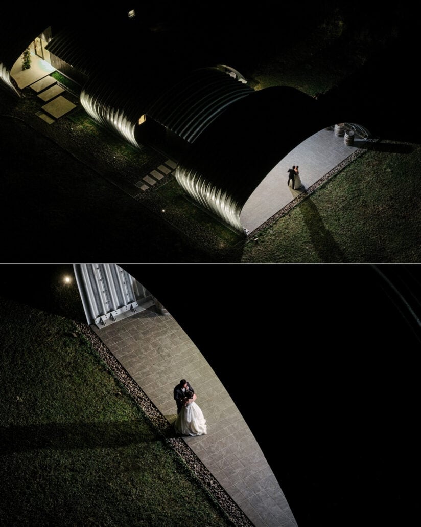 Seen from above at night, the couple dance on a lit path beside the curved silver vaults of Fujisan Winery, then hold each other in the lamplight.