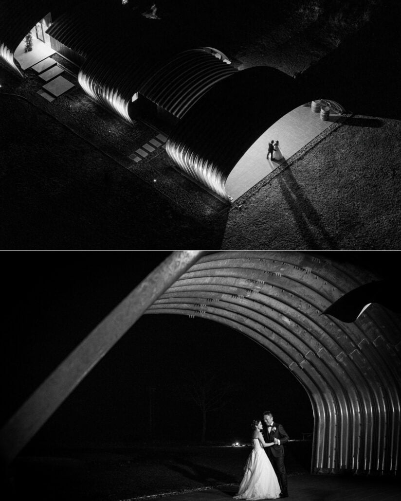 In black and white, an aerial finds the couple small on a lit path beside Fujisan Winery's arched roofs at night, then dancing under a steel arch.