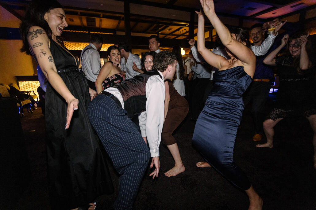 Guests dance hard late into the night at the reception.