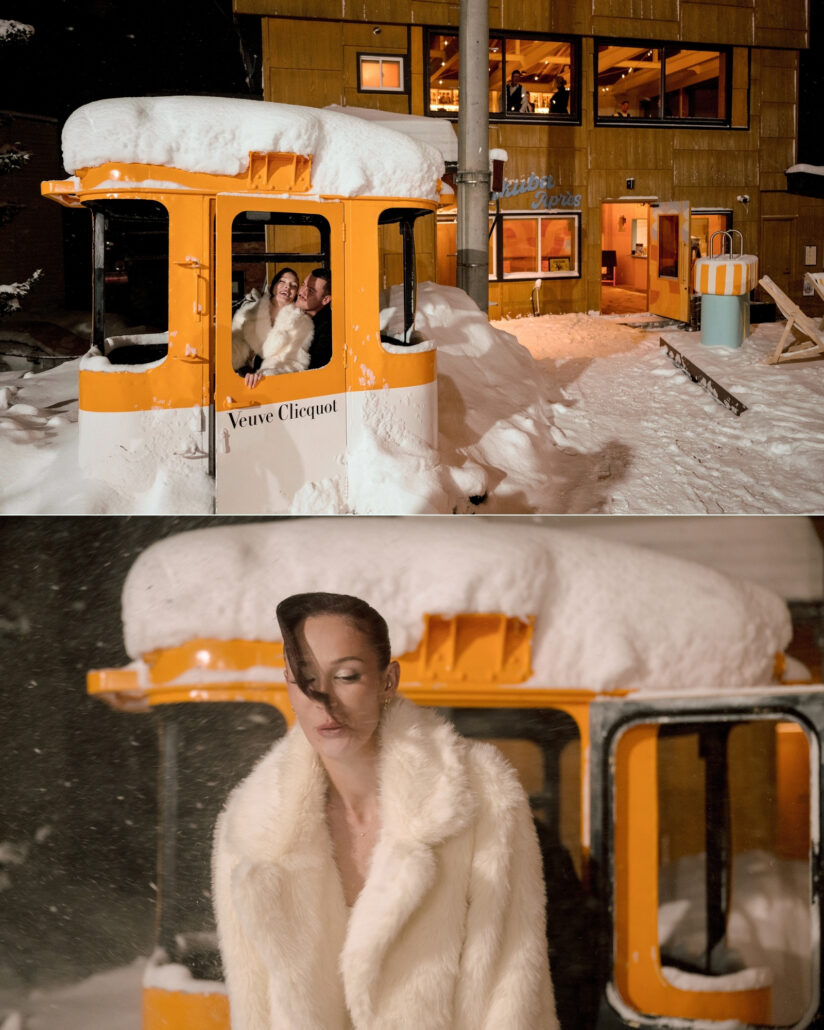 The couple tucked inside a snow capped orange gondola cabin beside a lit timber building at night, and the bride in white fur as snow blows through Hakuba.